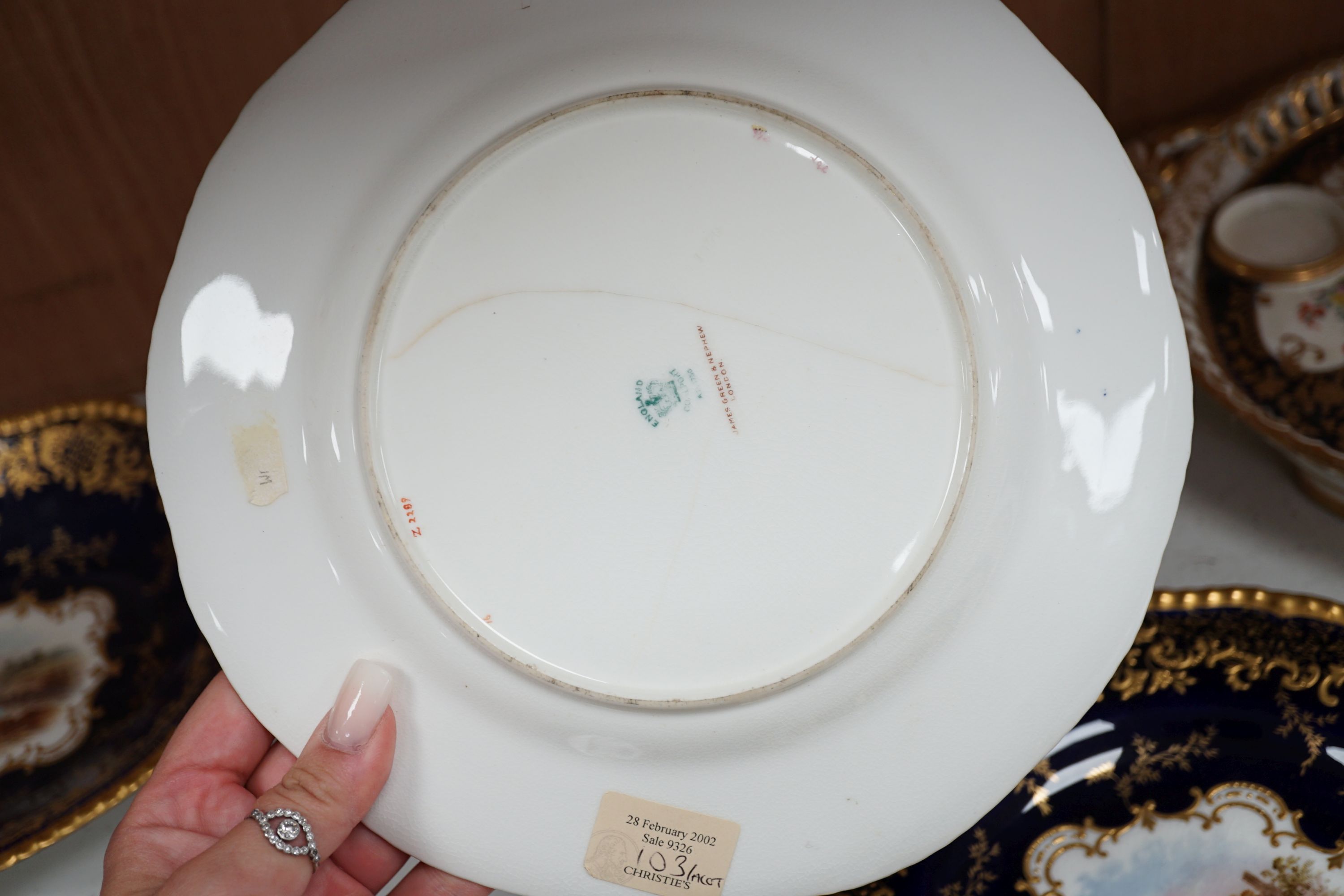 Four 19th century Coalport plates, a Coalport dish, a Minton plate, a Coalport inkstand in Chelsea style and a Derby cache pot, ink stand 40cms wide